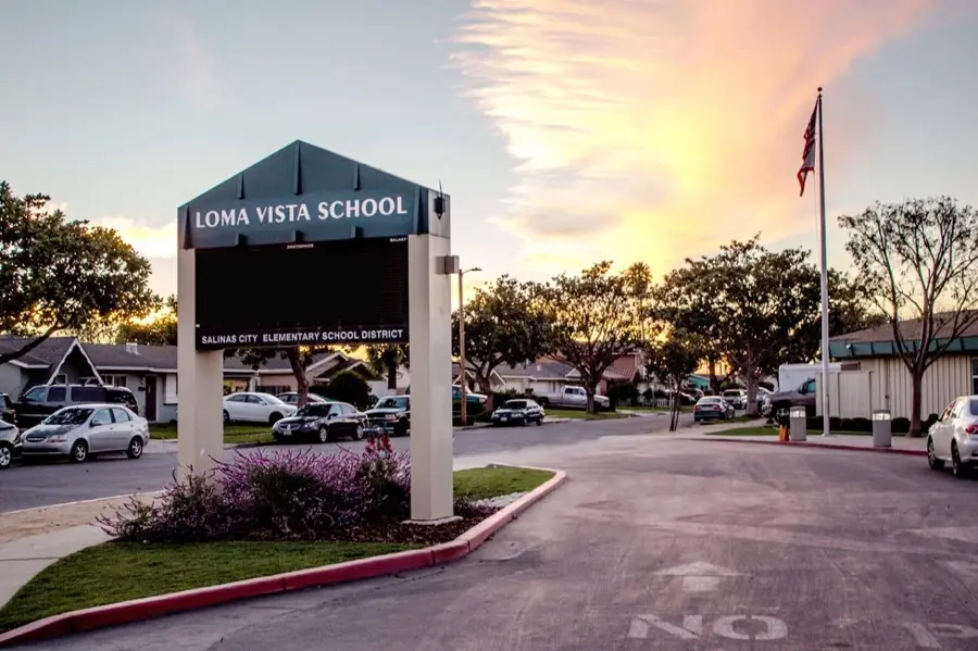 Loma Vista School entrance sign at sunset, Salinas City ESD